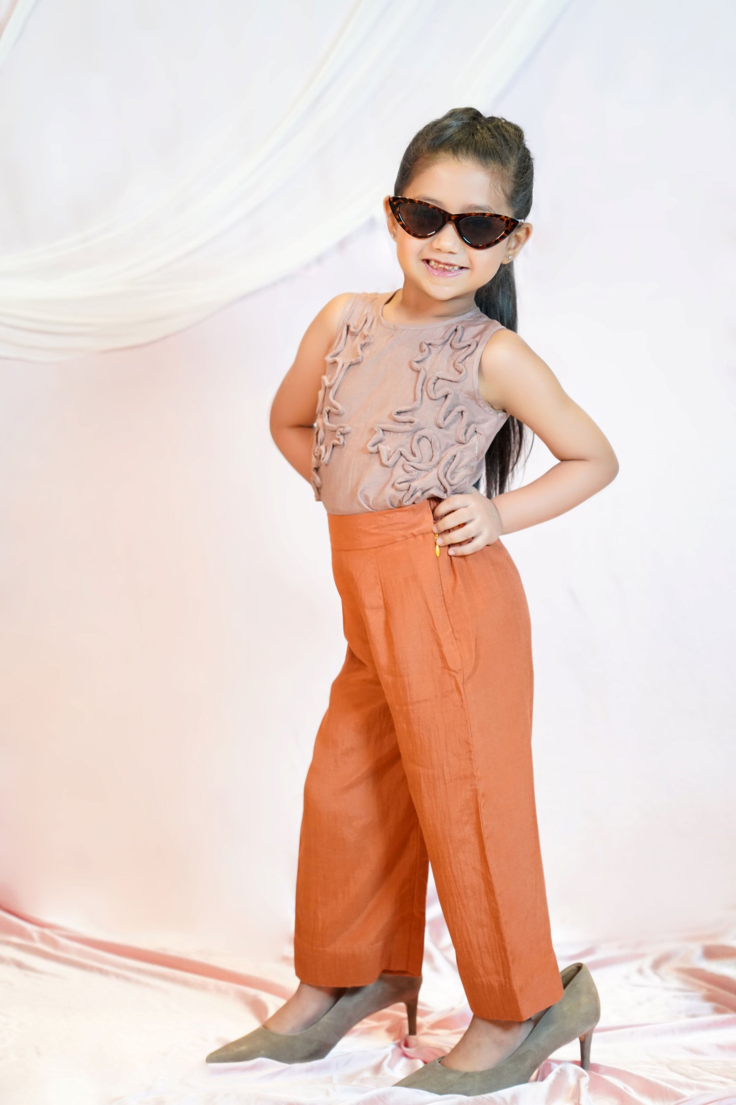 Sleeveless Top Paired With High Waisted Trousers For Kids