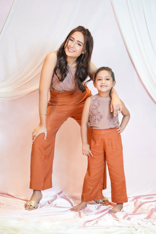 Sleeveless Top Paired With High Waisted Trousers For Kids