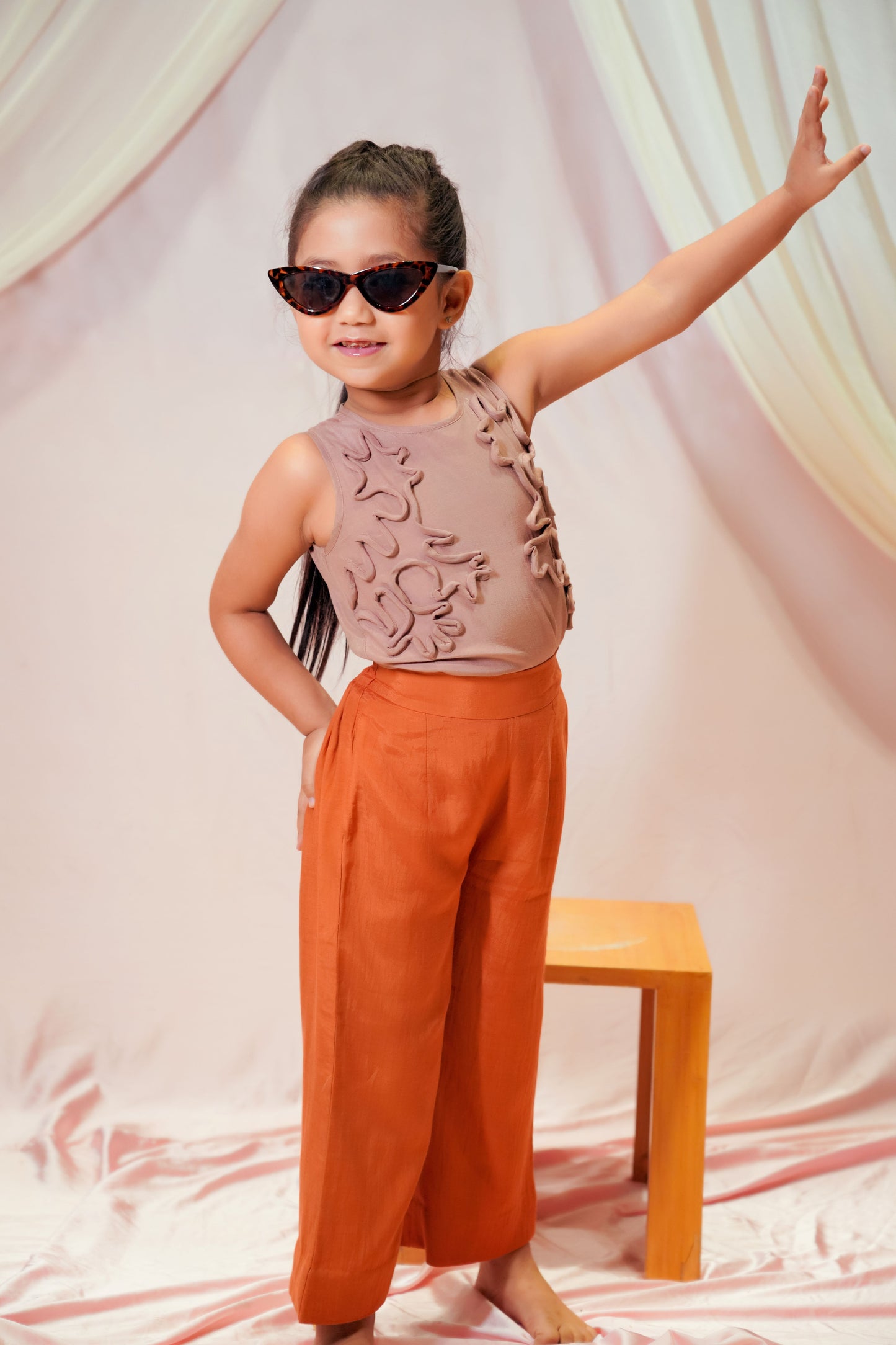Sleeveless Top Paired With High Waisted Trousers For Kids