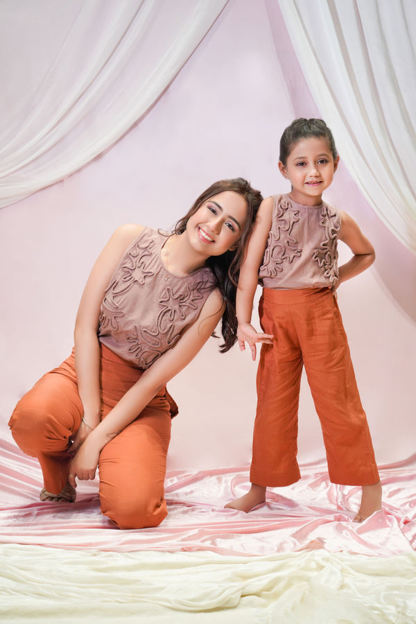 Sleeveless Top Paired With High Waisted Trousers For Kids